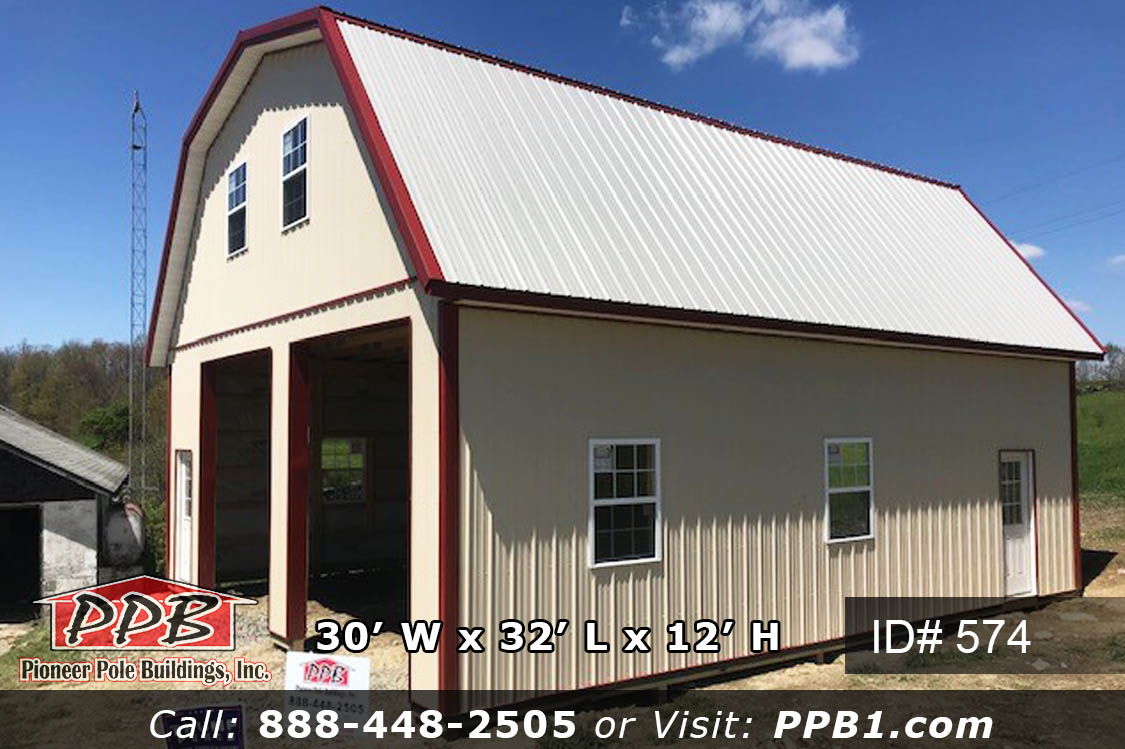 30’ W x 32’ L x 12’ H A Gambrel Garage with a Second Floor 30’ Gambrel Trusses, 2’ on Center Colors: Siding Color: Beige Roofing Color: Ash Gray Trim Color: Red