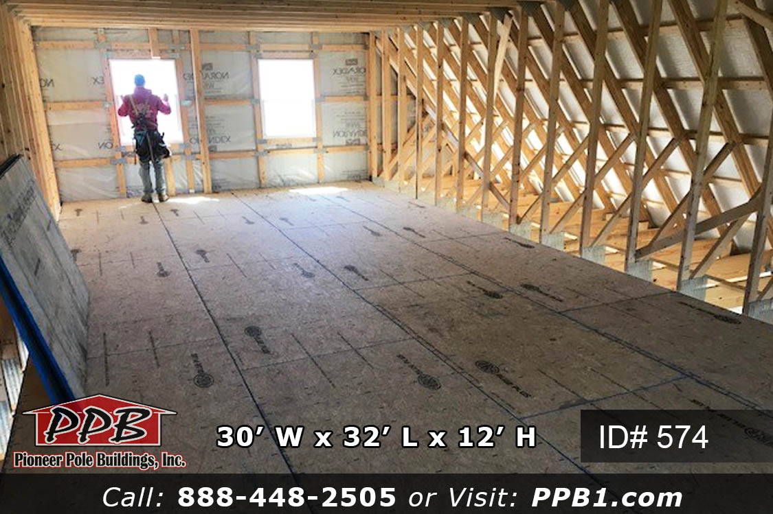 30’ W x 32’ L x 12’ H A Gambrel Garage with a Second Floor 30’ Gambrel Trusses, 2’ on Center Colors: Siding Color: Beige Roofing Color: Ash Gray Trim Color: Red