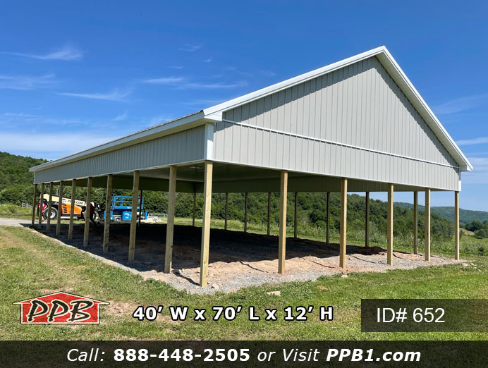 Pavilion that is 40 feet wide by 70 feet long with ash gray siding.