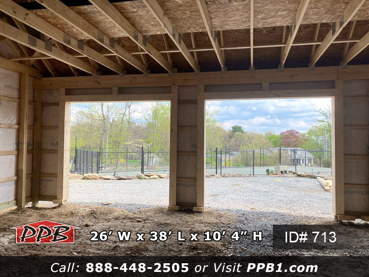 713 - Three-Car Board & Batten Garage