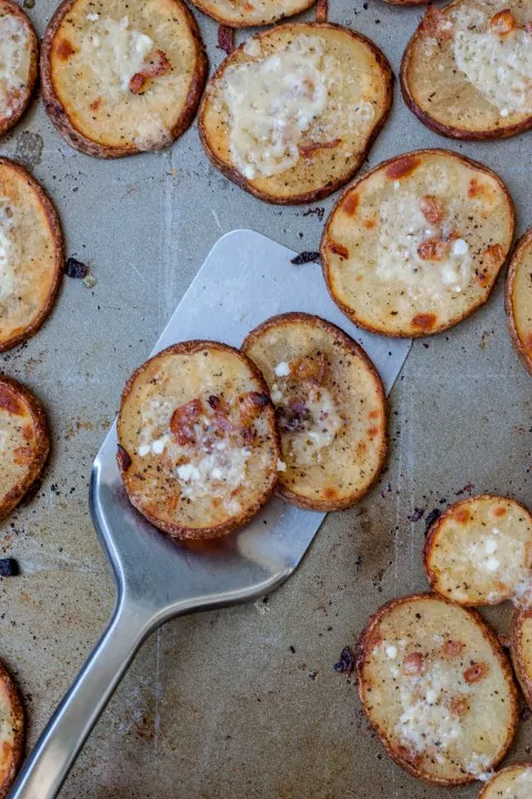 Baked potato chips topped with roasted onions and Parmesan cheese, crispy and golden.