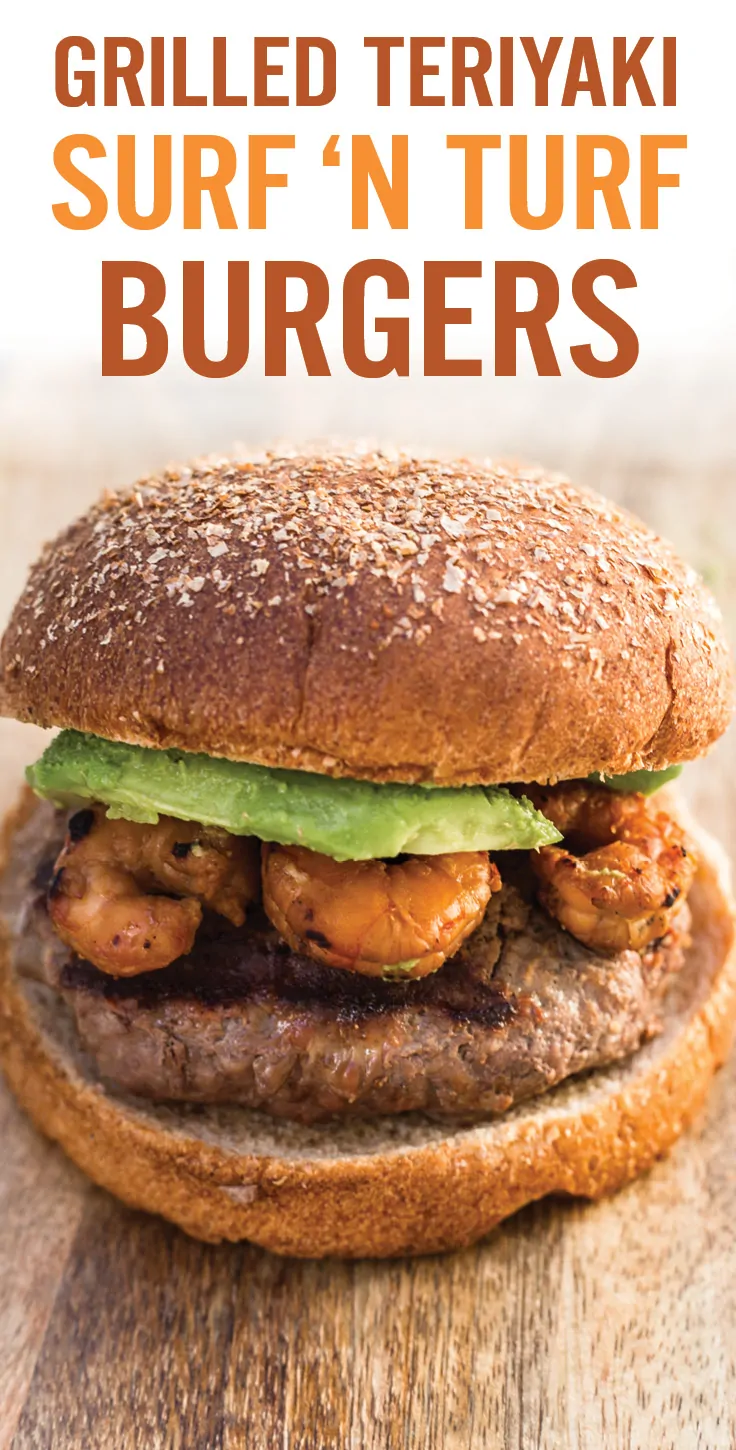 Delicious surf and turf burger with avocado and teriyaki glaze for a flavorful meal.