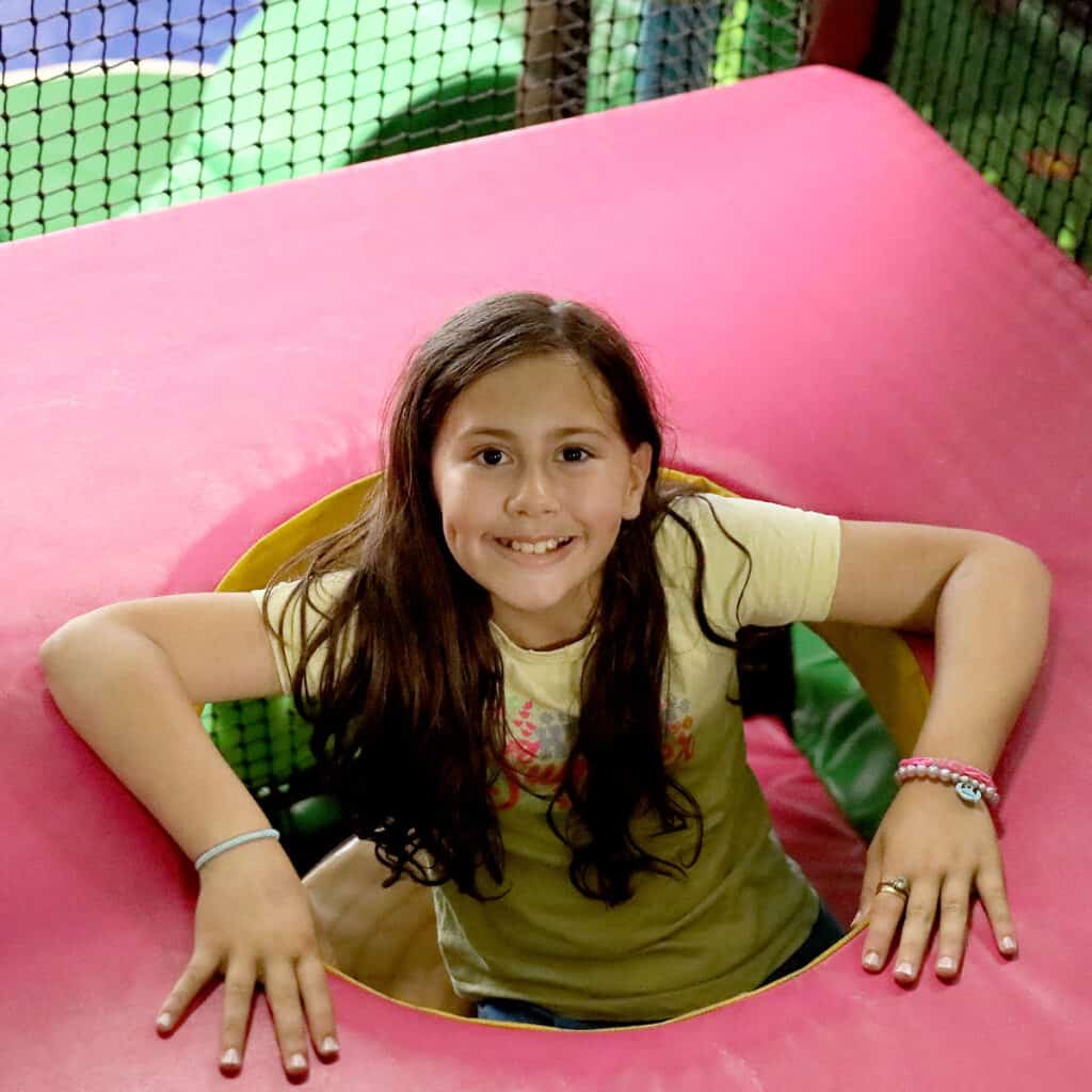 Young girl in a soft play area