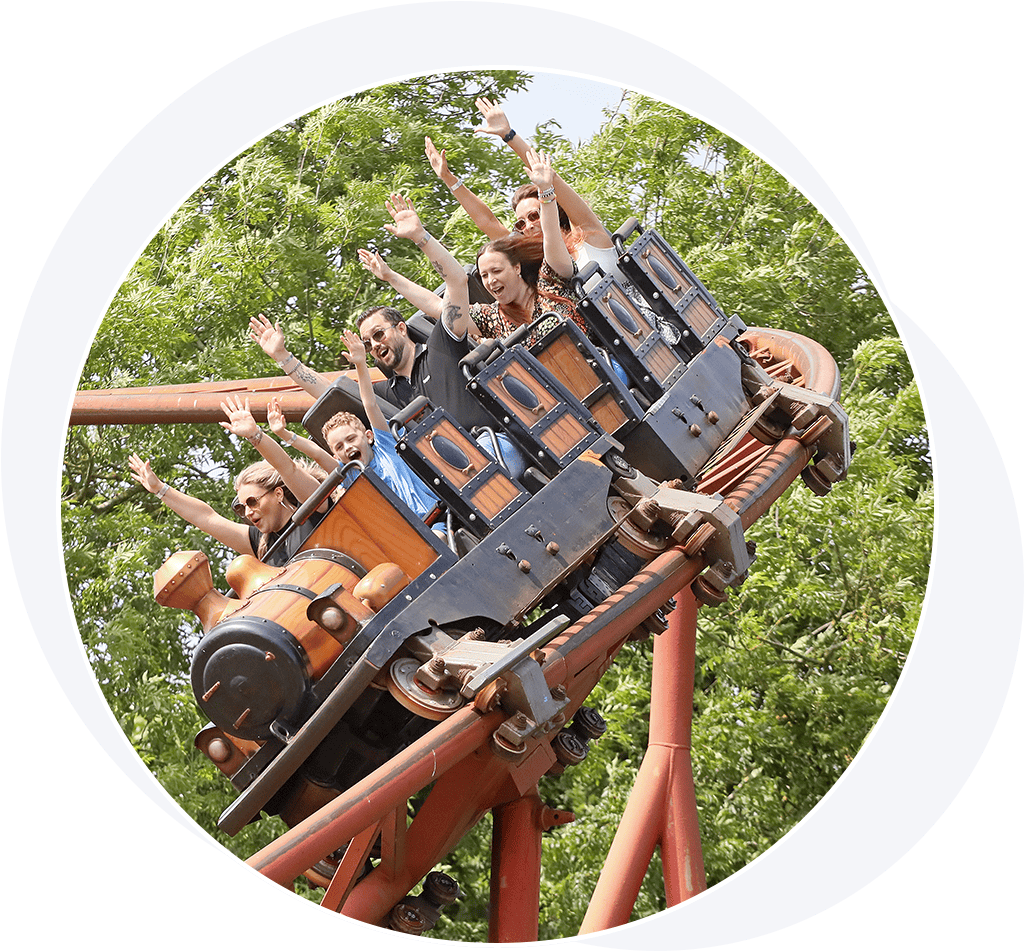 People on a roller coaster train