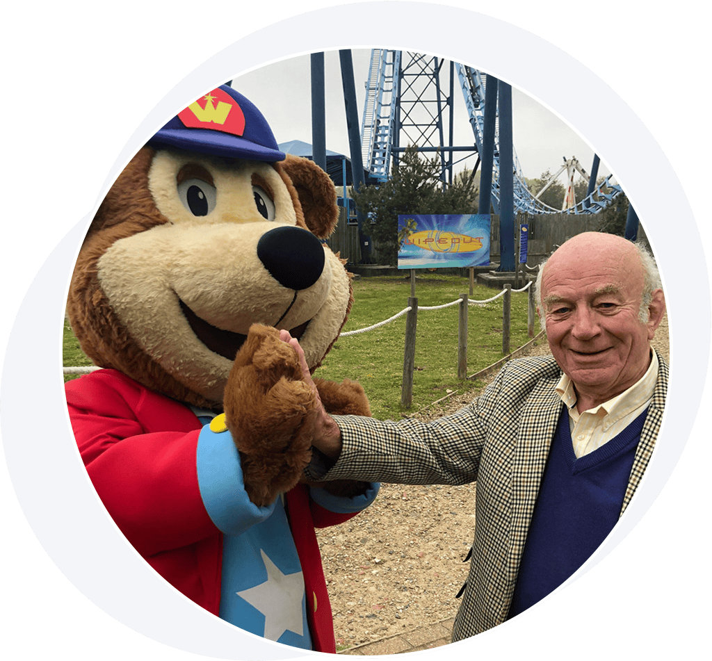 Man with bear mascot