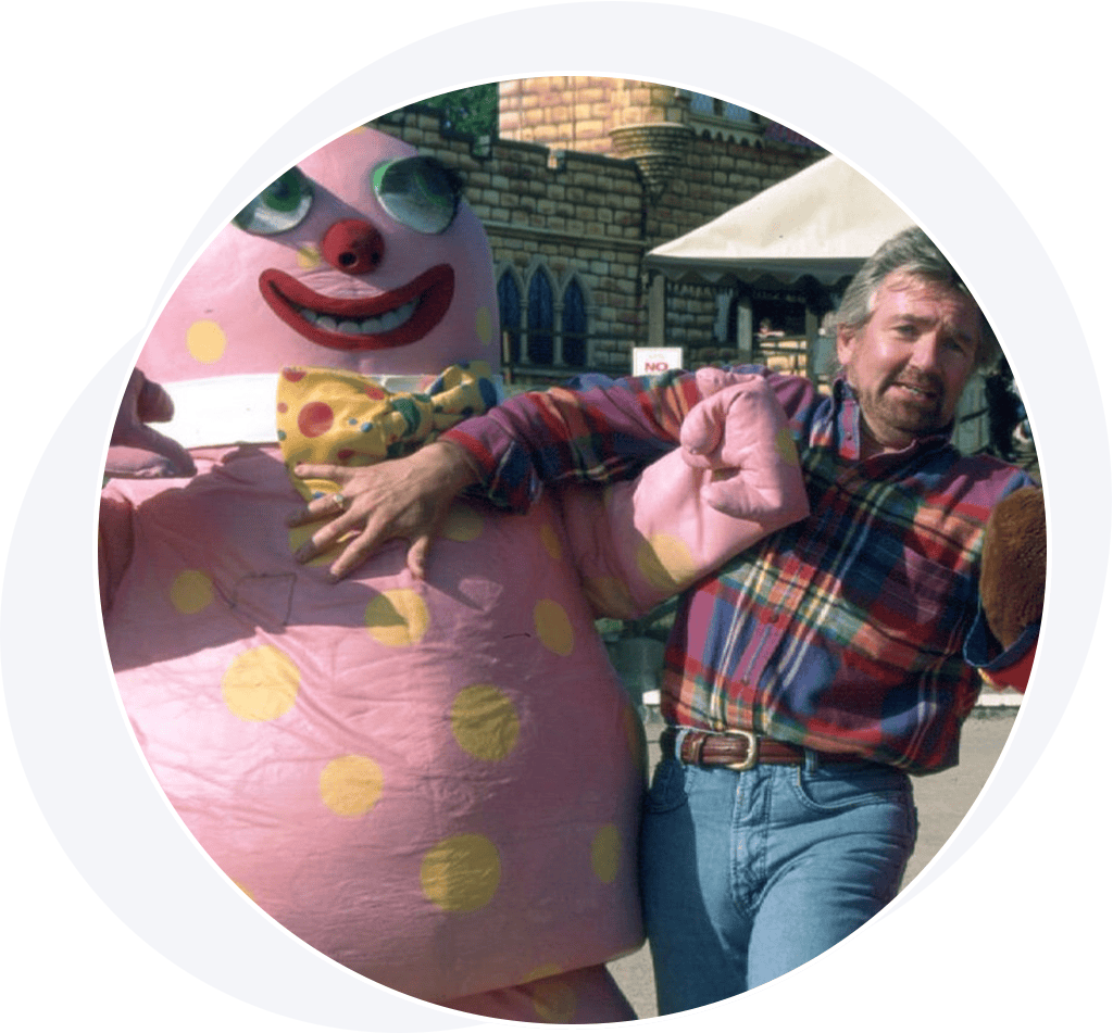 Bearded man and pink mascot