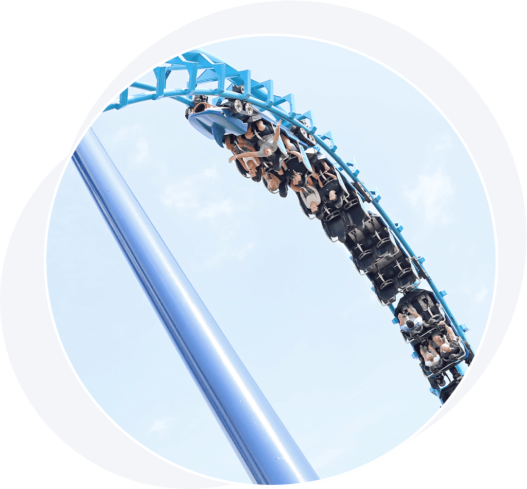 People on a blue roller coaster