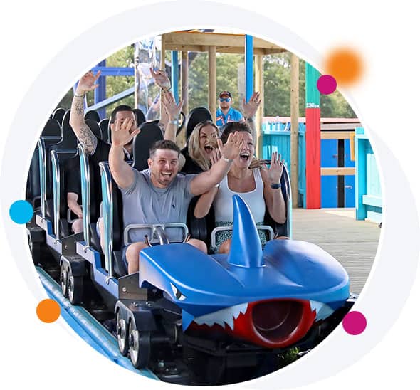 People on a blue roller coaster