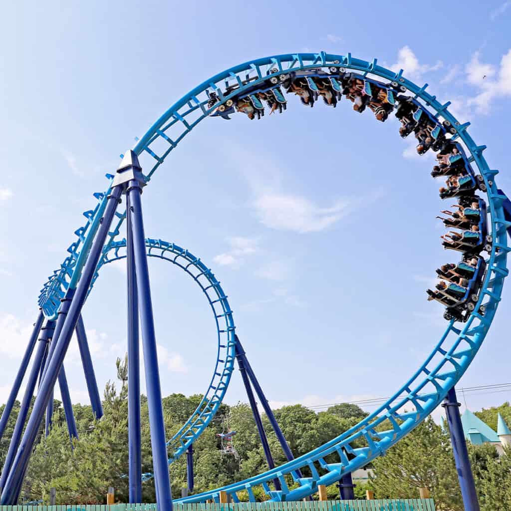 Blue rollercoaster and a blue sky