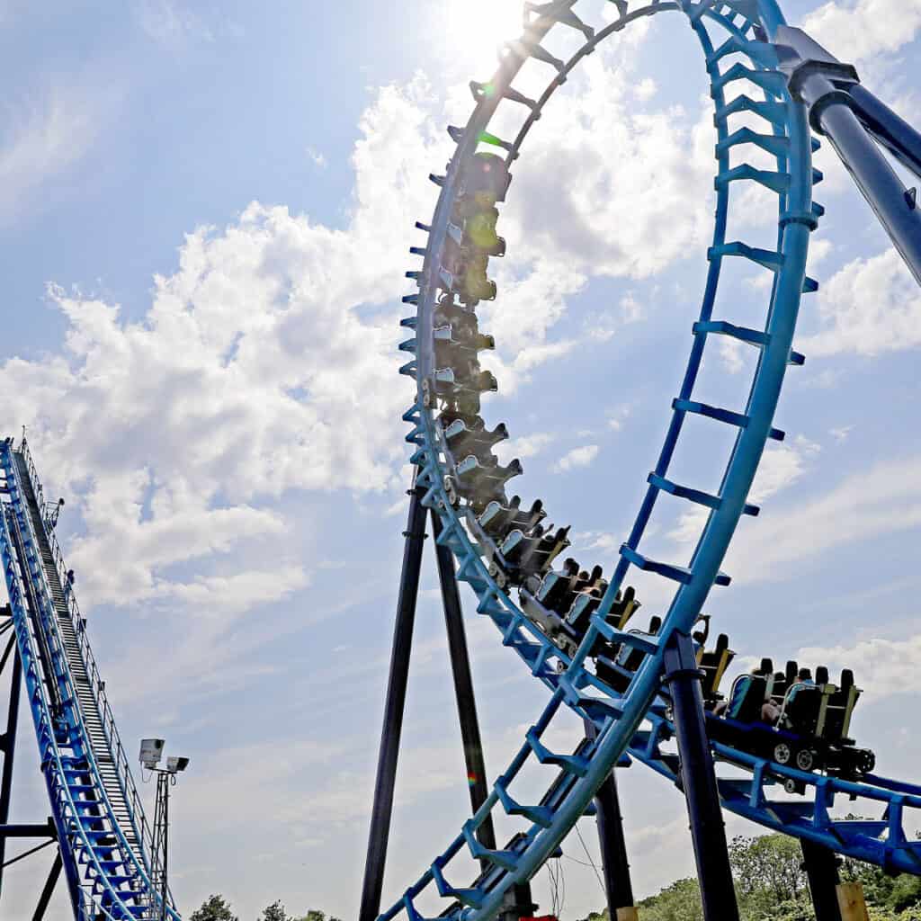 Blue rollercoaster in a loop the loop