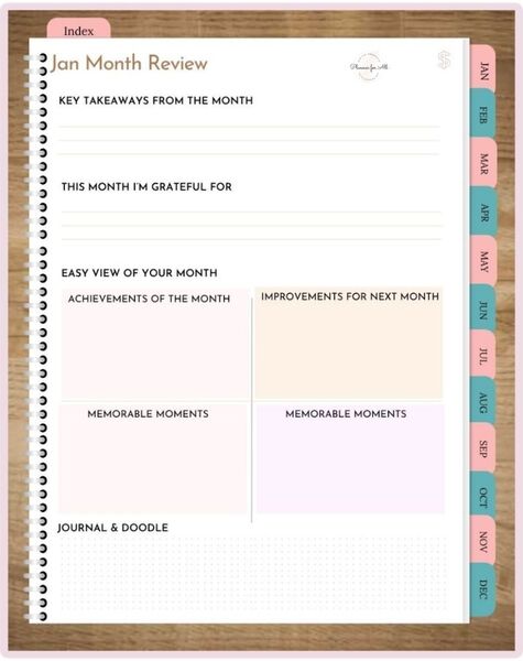 Digital planner page for monthly review, goal setting, and reflection with colorful tabs for each month, ideal for creating hyperlinked planners in Canva.
