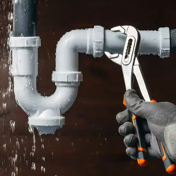 Plumber-Tightening-Leaking-PVC-Pipe