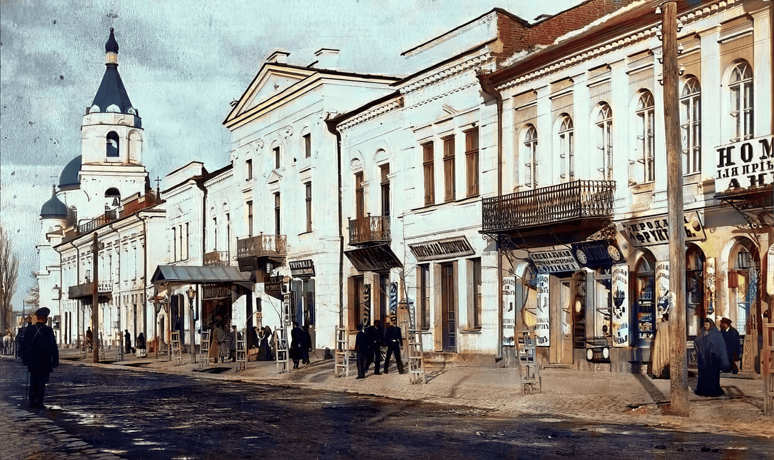 Історична вулиця Києва з старовинними будинками та церквою на фоні.