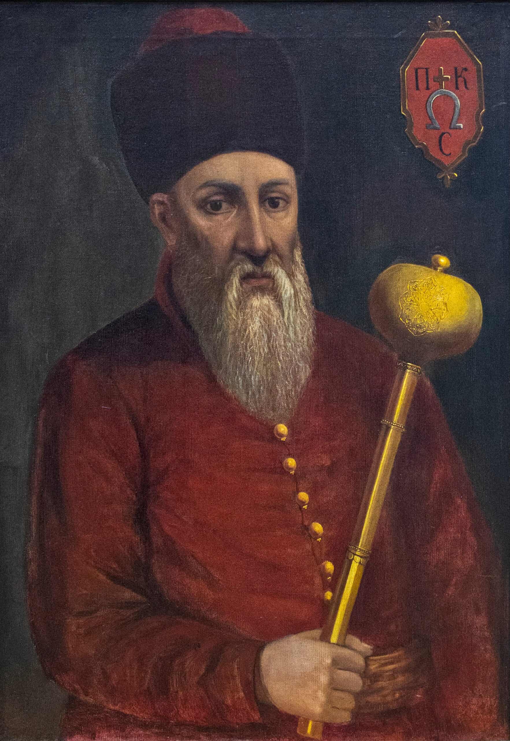 Портрет козацького ватажка в традиційному одязі з булавою.