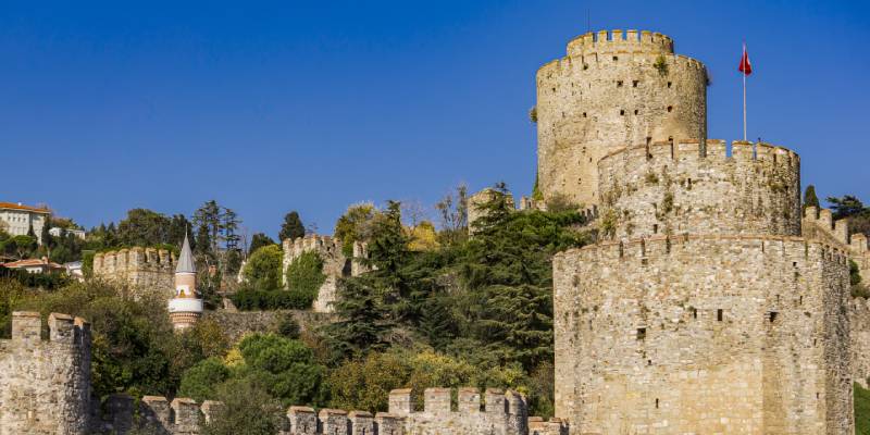 Yacht rental offering stunning views of Istanbul's historic Bosphorus Strait and its iconic landmark.