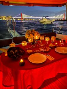 Luxury yacht dining experience with city skyline views.