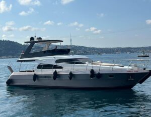 Front view of the P114 19m motor yacht moored at an Istanbul marina.