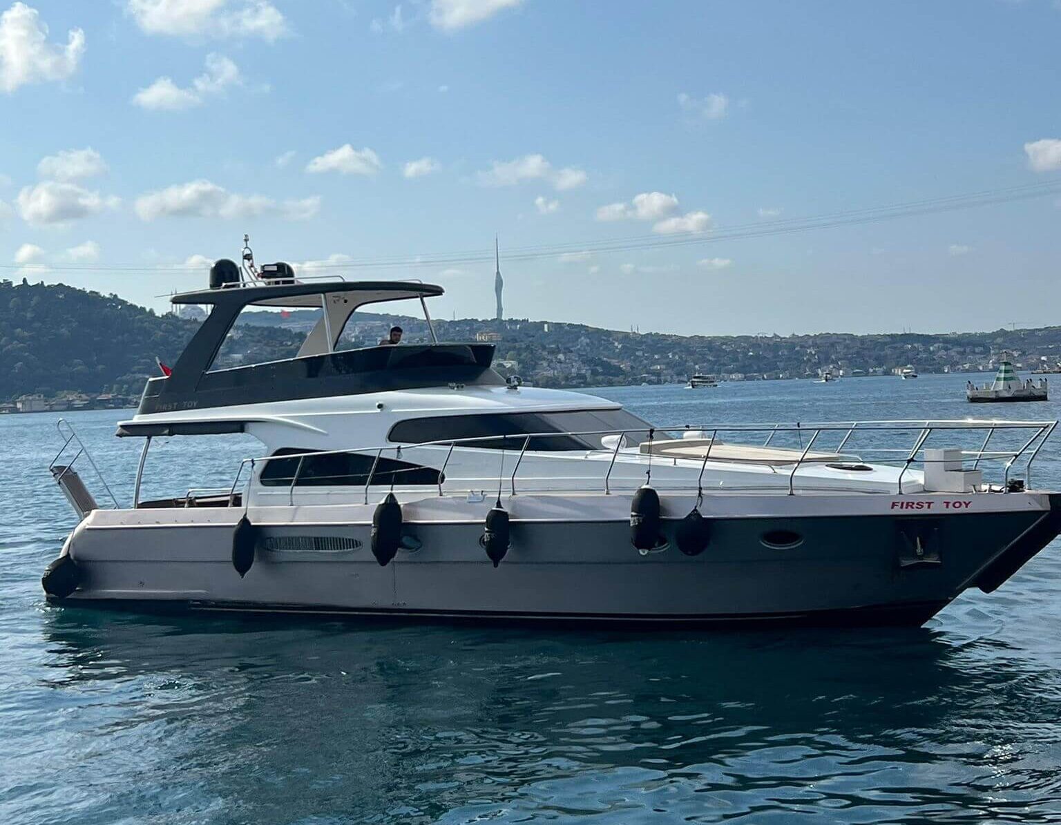 Front view of the P114 19m motor yacht moored at an Istanbul marina.