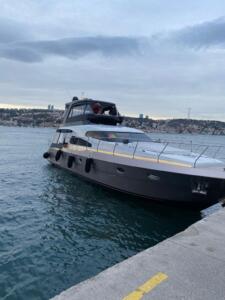 Side view of the P114 motor yacht cruising on the Bosphorus in Istanbul.