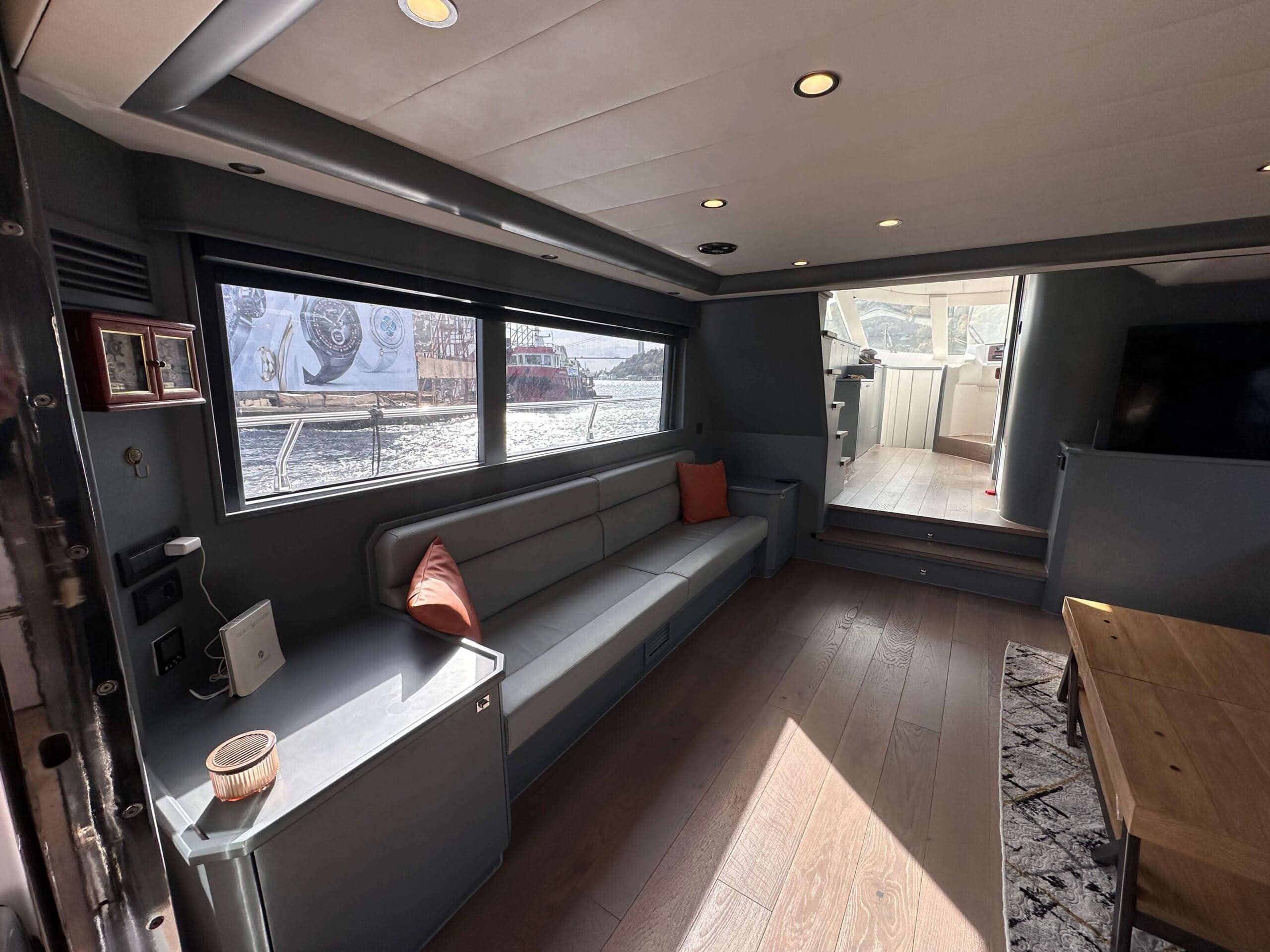 Luxury yacht interior with panoramic windows.
