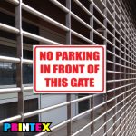 No Parking In Front Business Sign