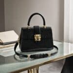 Illustrative image related to Anne Hathaway Stuns in Sleek Balenciaga Leather at Seoul Prada 2 Premiere, Elevates the Look with Bvlgari Serpenti Jewelry.