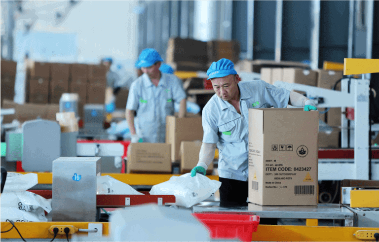 Environmentally friendly cat litter production facility, QingkePet manufacturing plant in operation worldwide cat litter production factory, eco-friendly materials, quality control, sustainable pet products.