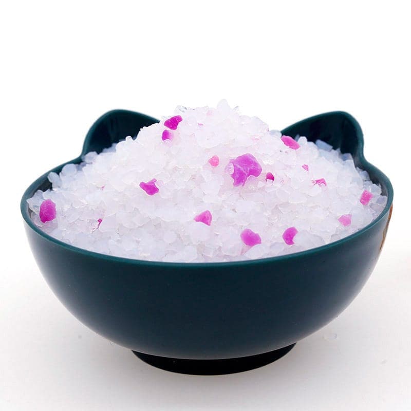 Freshly harvested eco-friendly cat litter with pink accents for odor control and absorption.