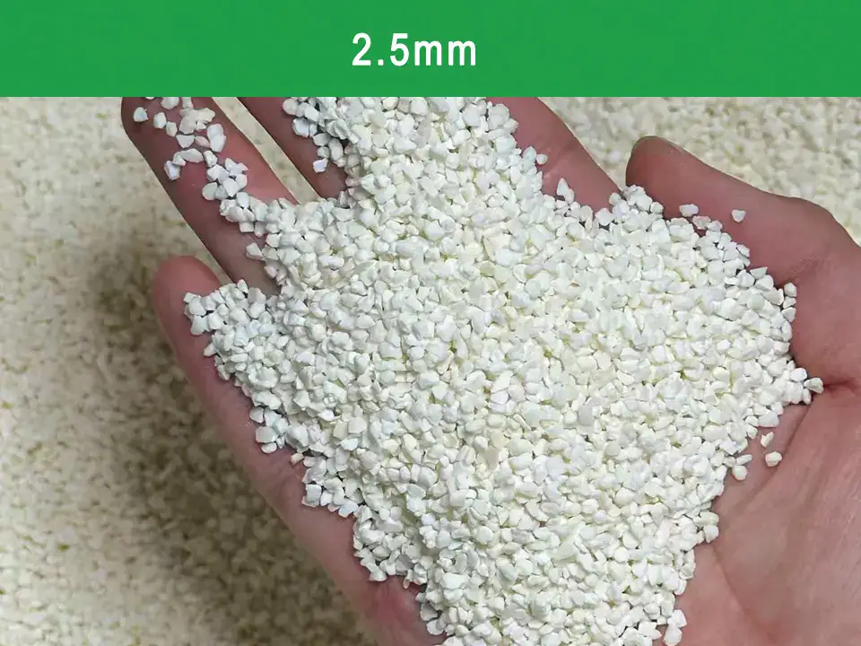 A close-up shot of uniform 2.5mm plant-based cassava cat litter, showcasing the consistent and durable granules designed for easy scooping and minimal tracking.