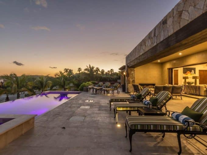 Puerto Los Cabos Luxury Villa Featuring A Stunning Pool And Outdoor Lounge Area With Ocean Views. Perfect For Relaxing And Enjoying The Beautiful Surroundings.