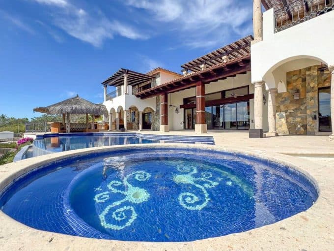 Puerto Los Cabos Luxury Villa Featuring A Stunning Pool And Elegant Architecture. Perfect For Enjoying The Serene Ocean Views And Vibrant Golf Course Surroundings.