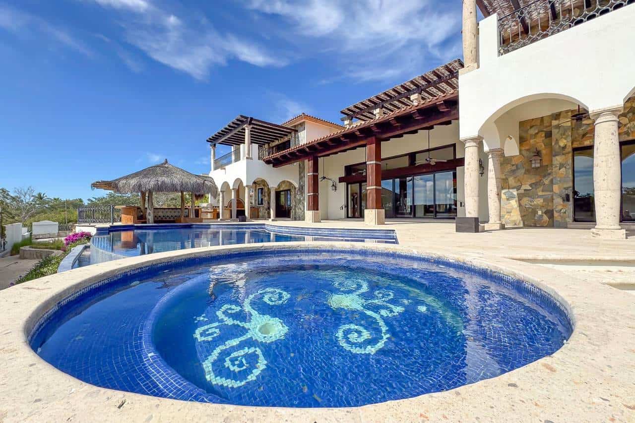 Puerto Los Cabos Luxury Villa Featuring A Stunning Pool And Elegant Architecture. Perfect For Enjoying The Serene Ocean Views And Vibrant Golf Course Surroundings.