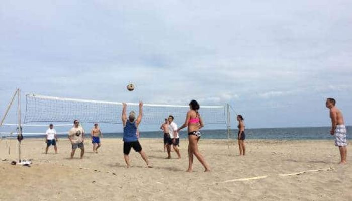 Beach Volleyball Game On The Sandy Shores Near Puerto Los Cabos