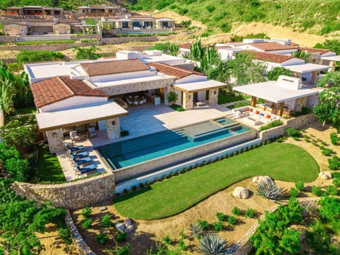 Home – Homes For Sale In Querencia Aerial View Of A Contemporary Luxury Villa With Infinity-Edge Pool, Spa, And Landscaped Garden Terrace In Querencia Real Estate, San José Del Cabo.