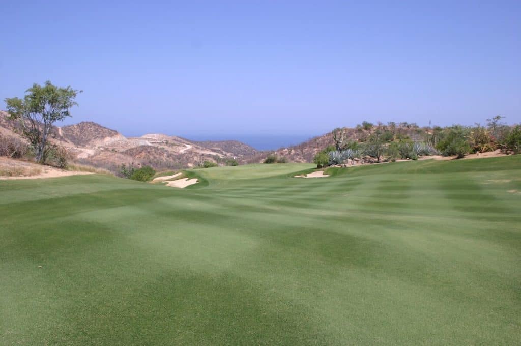 Querencia Golf Club Green Surrounded By Desert Hills And Lush Fairways In Los Cabos