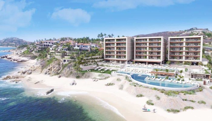 Breathtaking View Of Querencia'S Luxurious Beachfront Resort With Modern Architecture, Infinity Pools, And Serene Sandy Beach, Offering An Exclusive Oceanfront Living Experience.