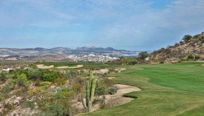 Querencia Golf Club Los Cabos With Desert Fairways, Palm Trees, And Panoramic Mountain Views