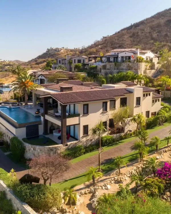 Luxurious Querencia Estate With A Private Pool, Lush Landscaping, And Stunning Hillside Views In A Gated Community. Perfect For Elegant Living And Entertaining.