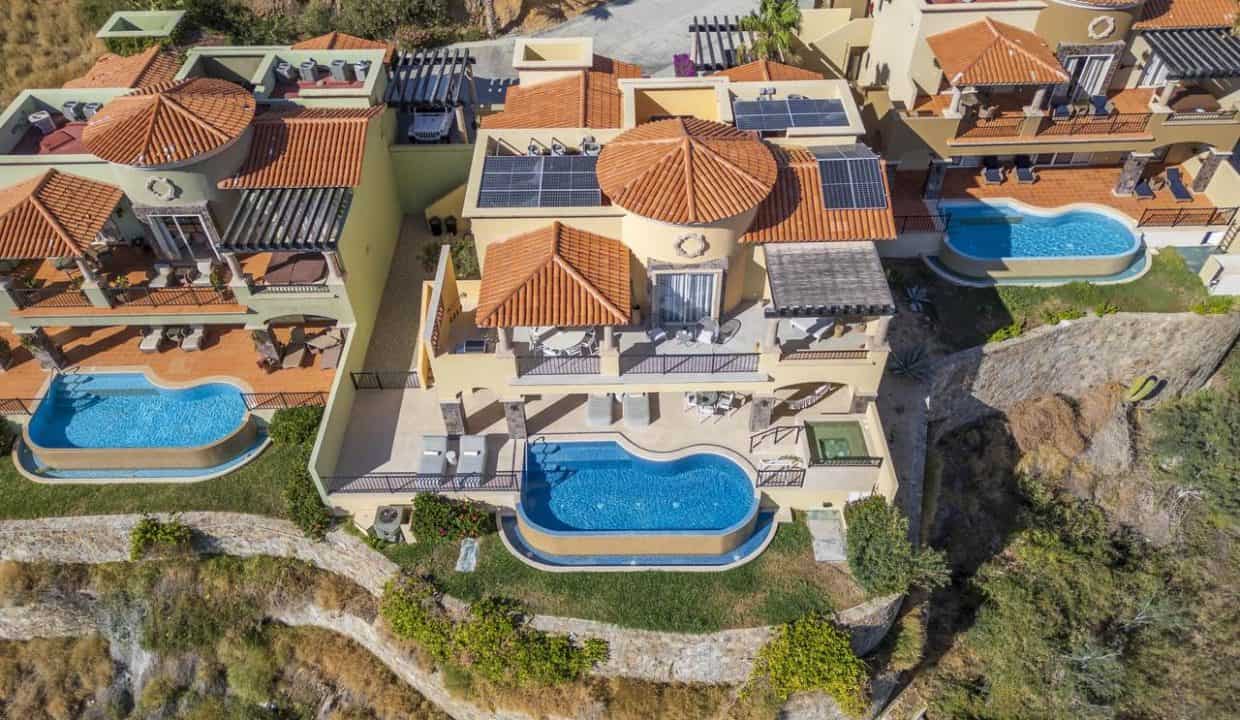 Luxury Hillside Villas With Private Pools At Quivira Los Cabos, Showcasing Stunning Ocean Views, Modern Architecture, And Southwest Mexican Design Elements For An Exclusive Real Estate Experience.