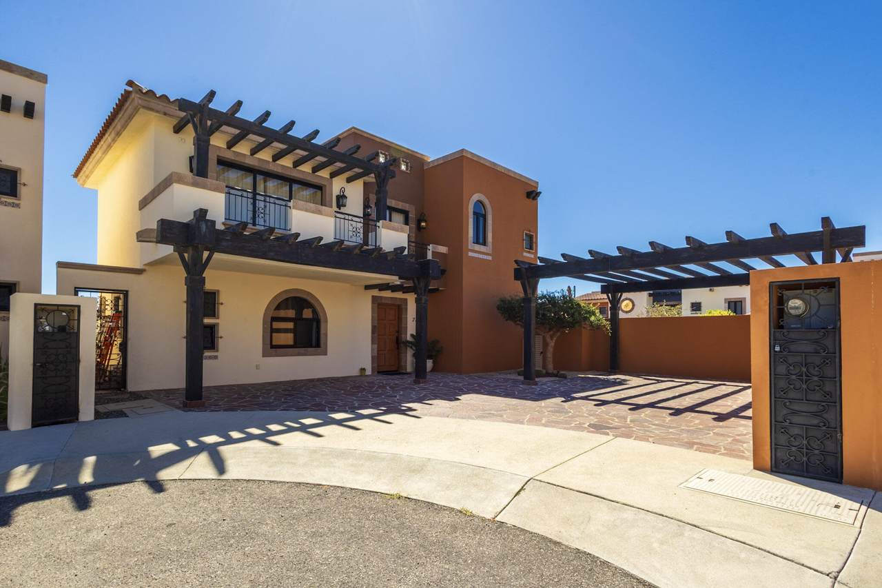Quivira Los Cabos Villa With Stunning Architecture, Outdoor Pergolas, And Vibrant Exterior Design, Perfect For A Luxurious Lifestyle.