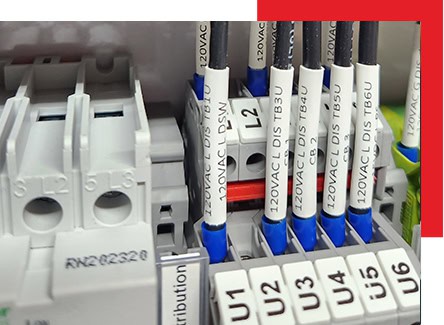 High-quality electrical wiring and distribution system components for automation and control panels, showcasing organized wiring setup and circuit connections.