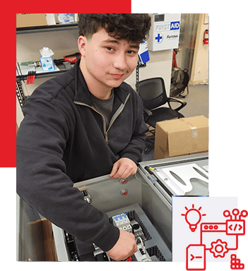 Student working on automation and robotics project in a classroom environment.