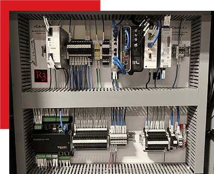 Heavy-duty industrial automation control panel with programmable logic controllers and wiring for optimized manufacturing processes.