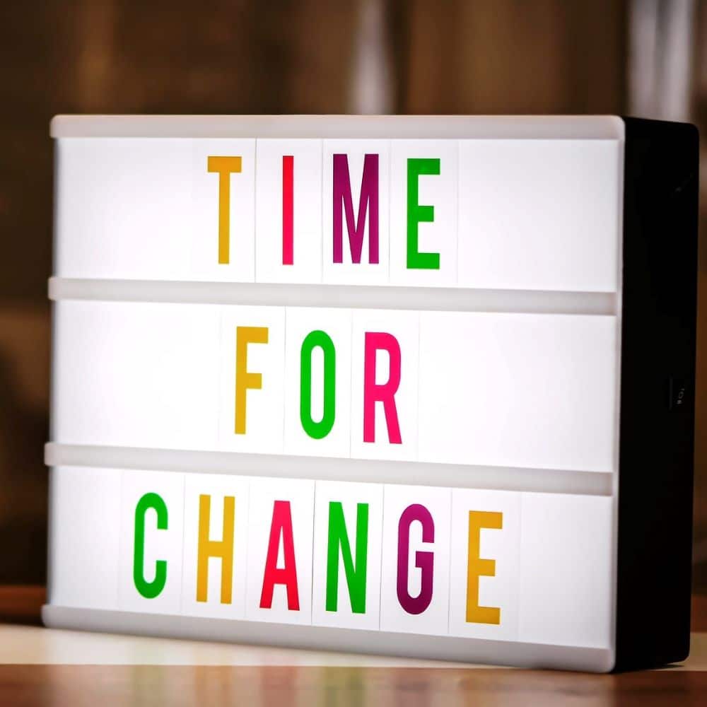Lightbox with colorful letters spelling "Time for Change" for motivation and awareness.