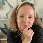 Creative woman working at her desk in a modern office environment.