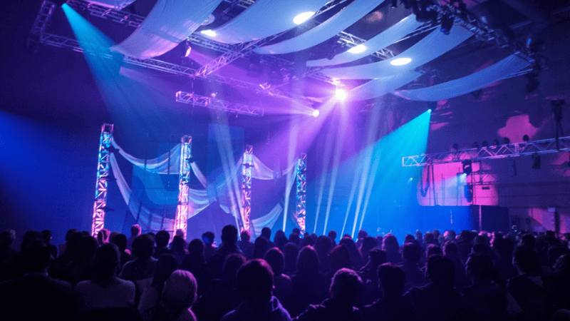 The psychedelic stage flood light renders the atmosphere