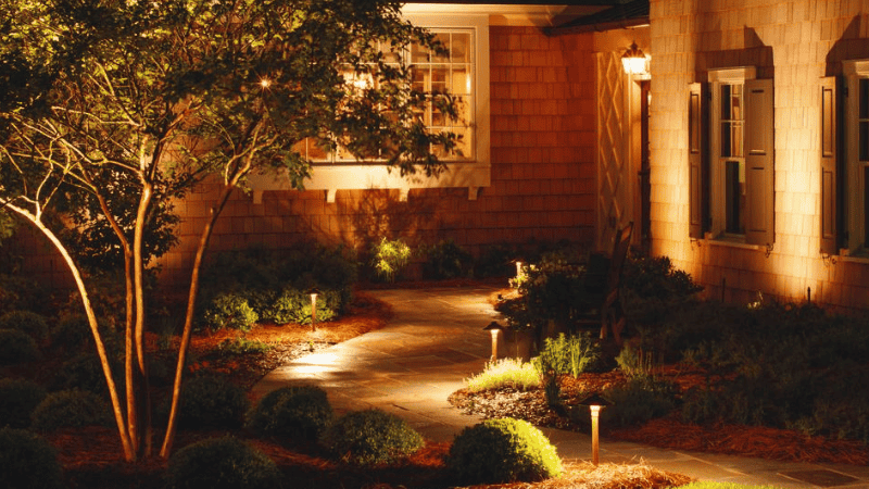 Placing lights on both sides of your door or hanging light above it can brighten up the entrance nicely. 