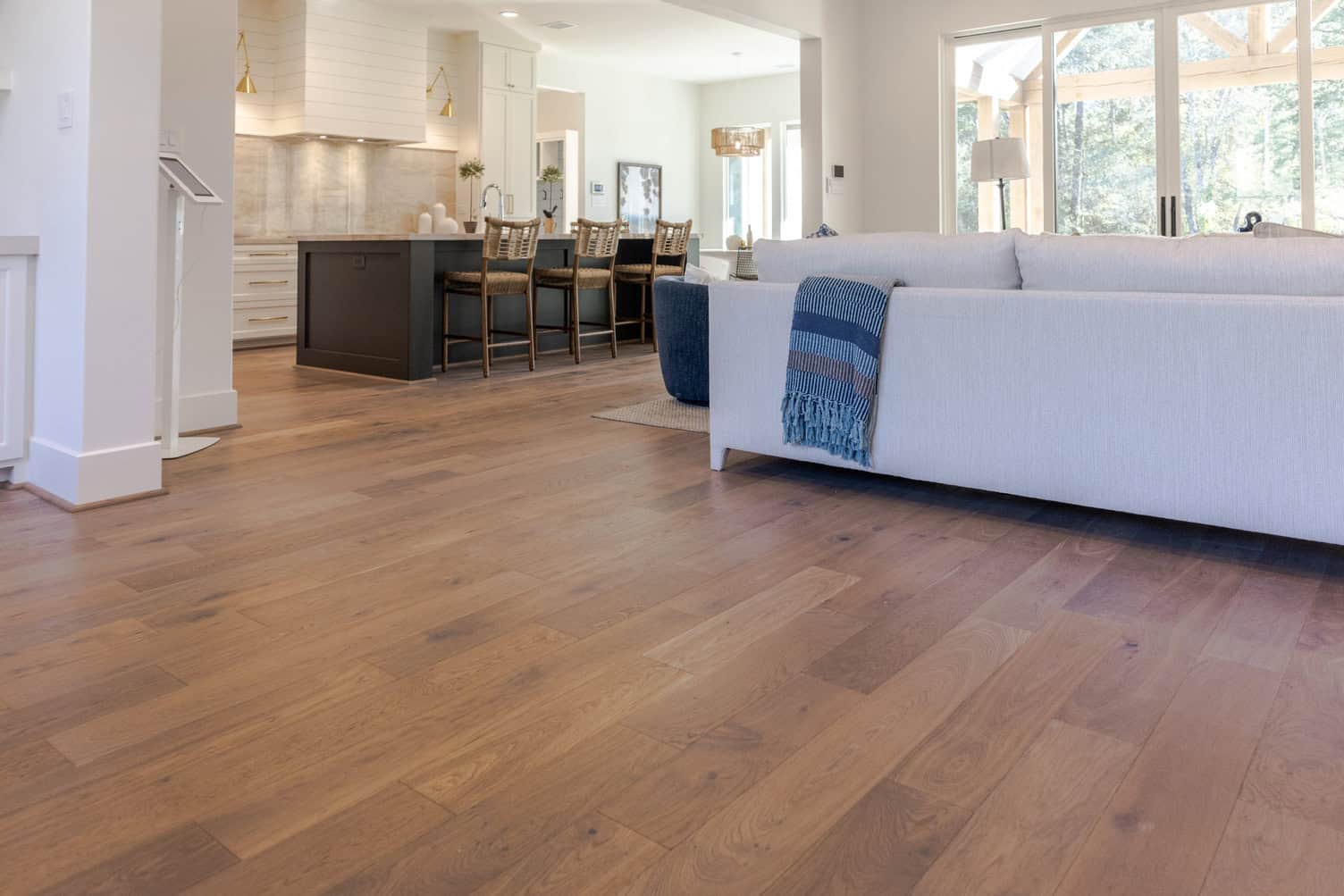 Wood flooring in a modern Surrey living room with natural oak finish.