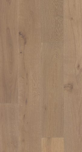 Close-up of natural oak wood flooring with visible grain and knots.