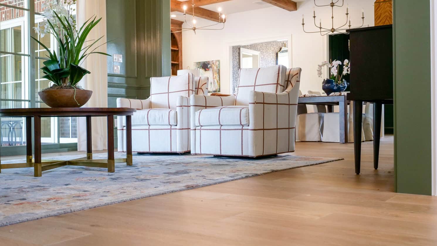 Warm living room with modern Southern style and European White Oak floors underfoot.